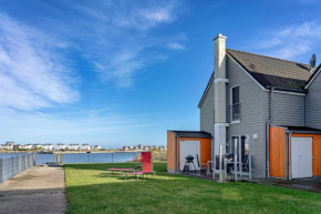 Ferienhaus-Am-Meer-by-Seeblick-Ferien-ORO-direkte-Wasserlage-Sauna-Kamin in Olpenitz